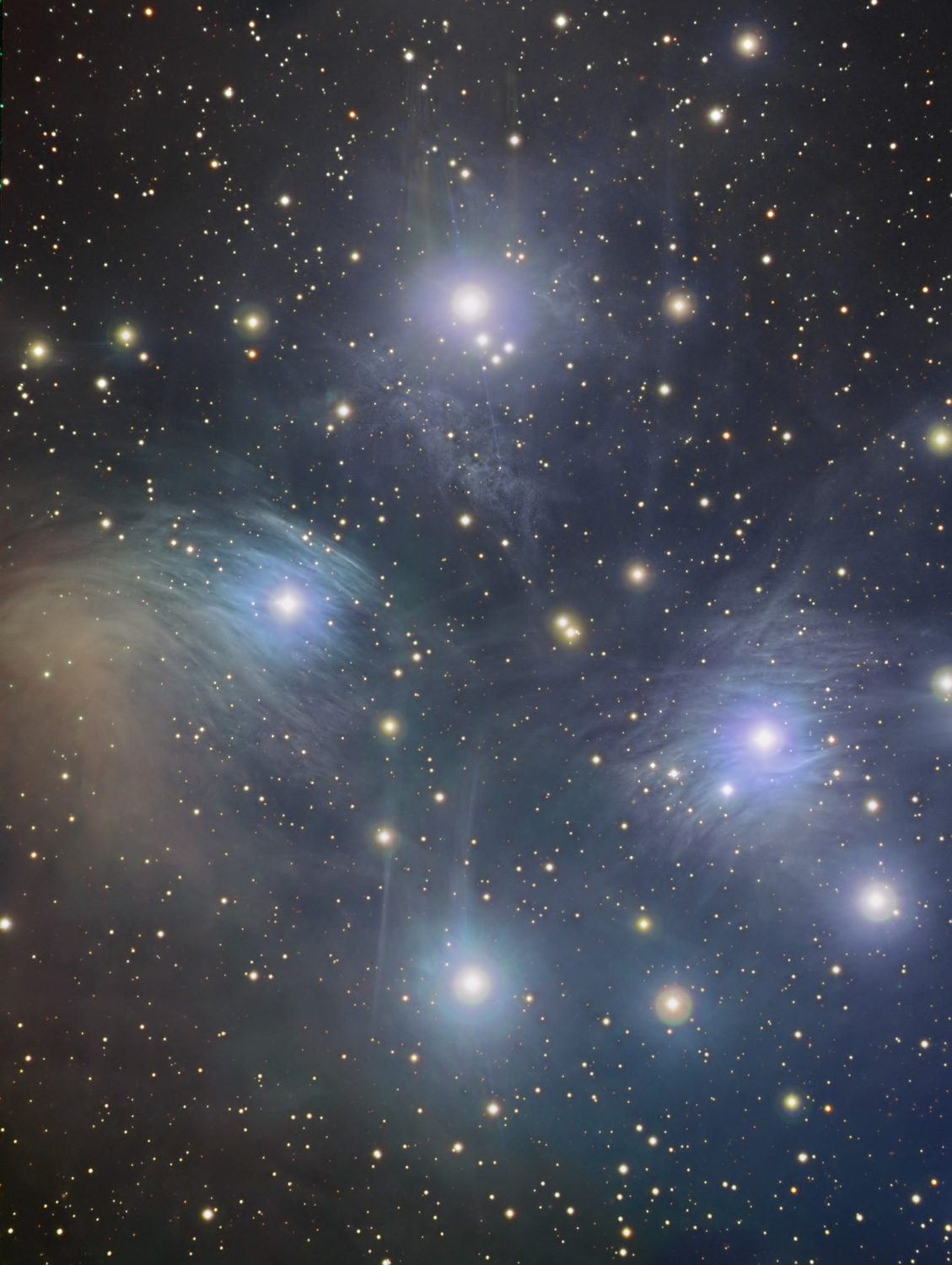 Sisters in a Circle: Pleiades Cluster Shines Bright in Skywatcher Photo